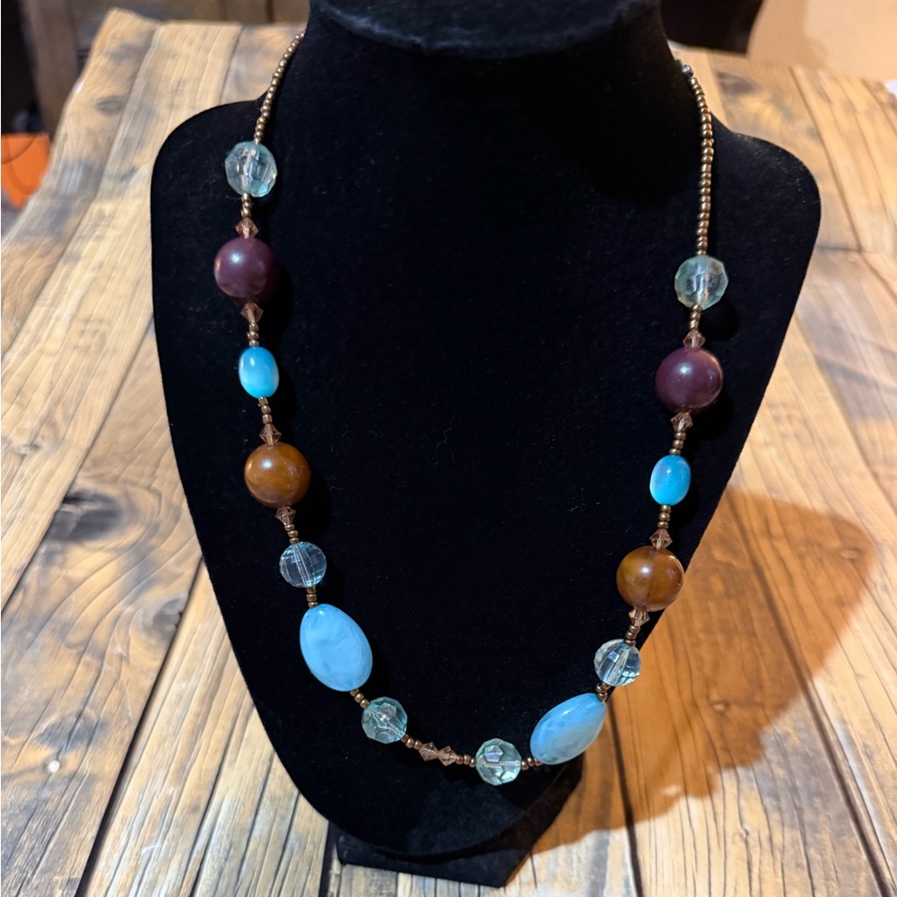 Chic Beaded Necklace with Blue and Brown Accents and earrings